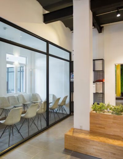 Nobody in office lobby with wooden bench